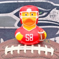 LILALU rubber duck football player on a football